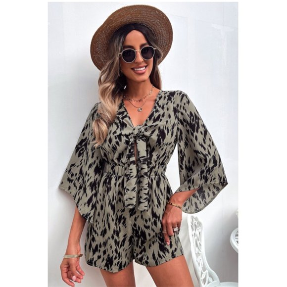 A Classy Chic Boutique Pants - Printed Tie Front Deep V Bell Sleeve Romper